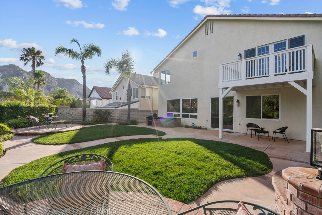 25930 Franklin Lane Stevenson Ranch, CA 91381 - Photo 37 of 47 a swimming pool with outdoor seating and yard
