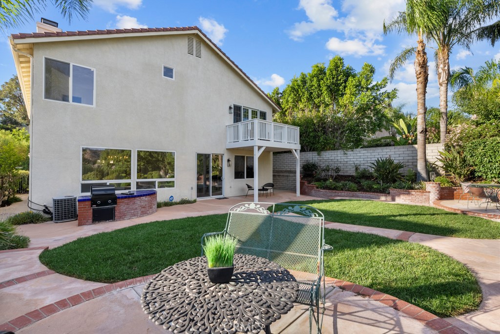 25930 Franklin Lane Stevenson Ranch, CA 91381 - Photo 38 of 47 a view of a house with backyard sitting area and garden
