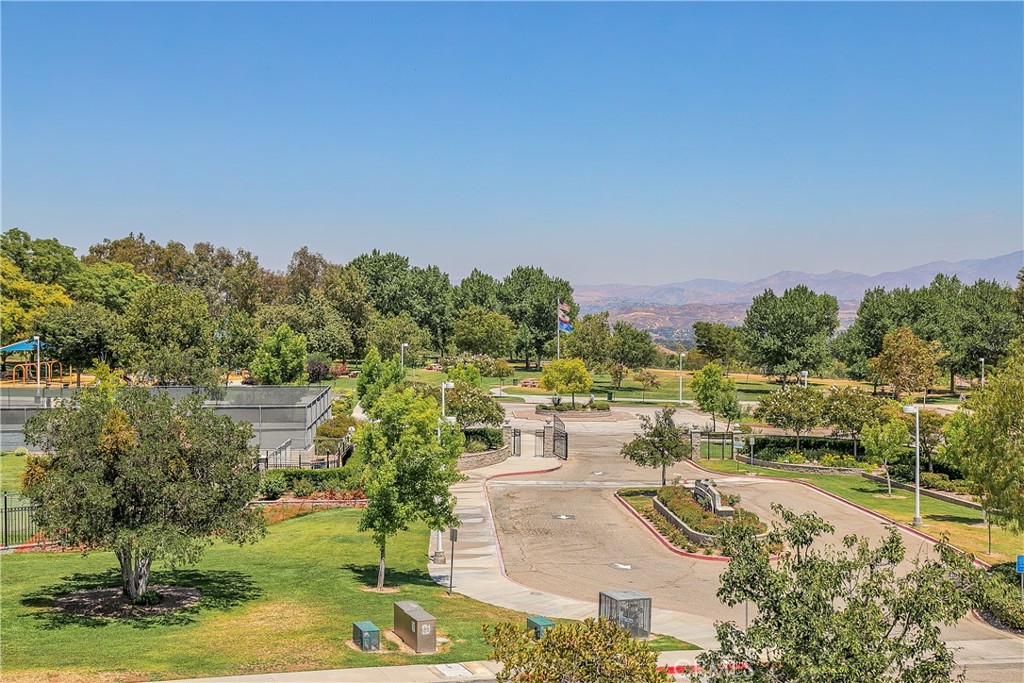 25930 Franklin Lane Stevenson Ranch, CA 91381 - Photo 45 of 47 a view of a swimming pool and trees in the background