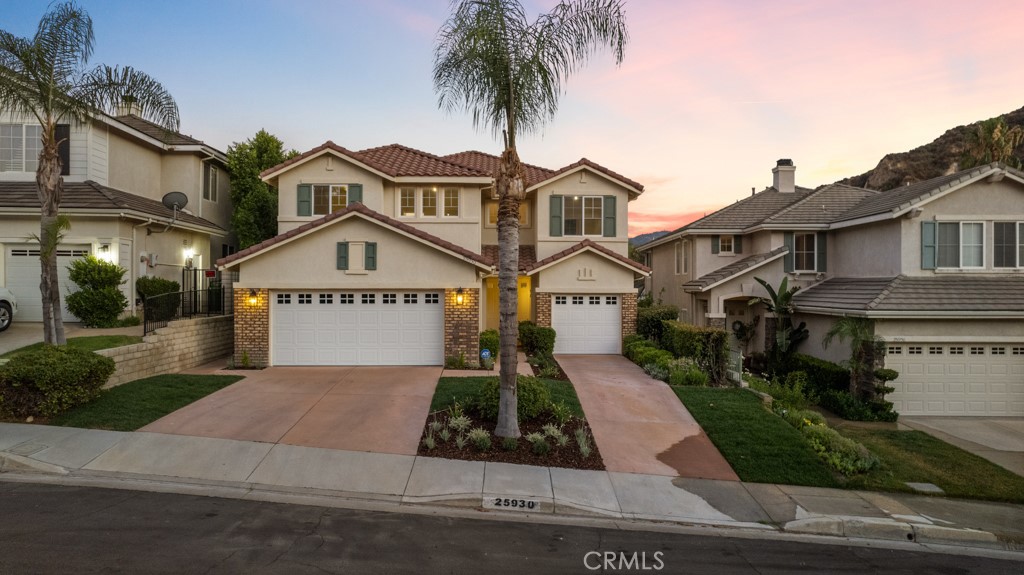 25930 Franklin Lane Stevenson Ranch, CA 91381 - Photo 47 of 47 a front view of a house with yard