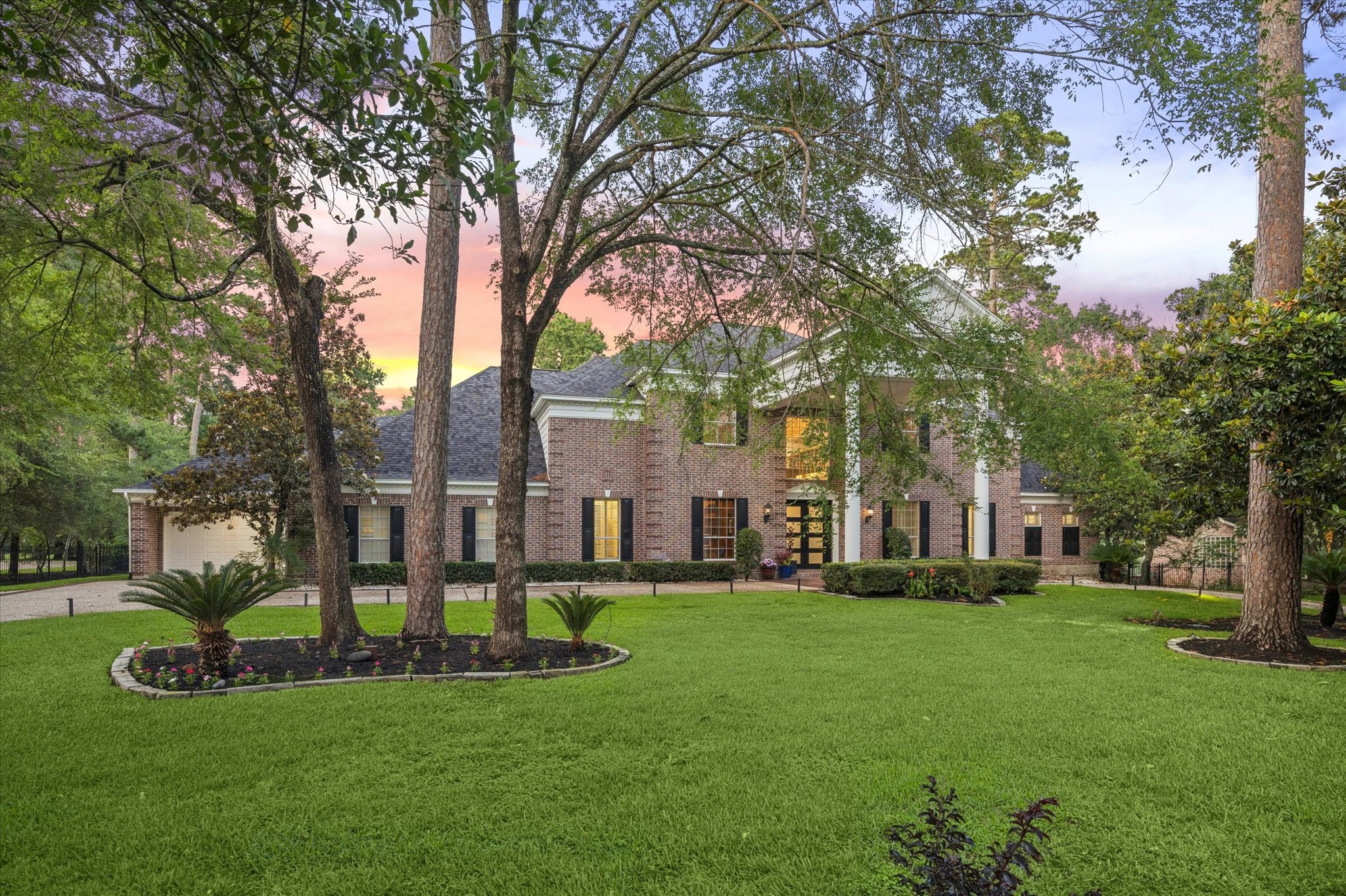 35 North Regent Oak Spring, TX 77381 - Photo 1 of 43 This beautiful and stately residence showcases timeless traditional architecture and was thoughtfully designed by renowned custom builder Bill Hallmark, celebrated for crafting luxury golf course homes and distinguished custom estates throughout The Woodlands. Its elegant façade, classic proportions, and enduring design reflect the exceptional quality and craftsmanship for which his homes are known.