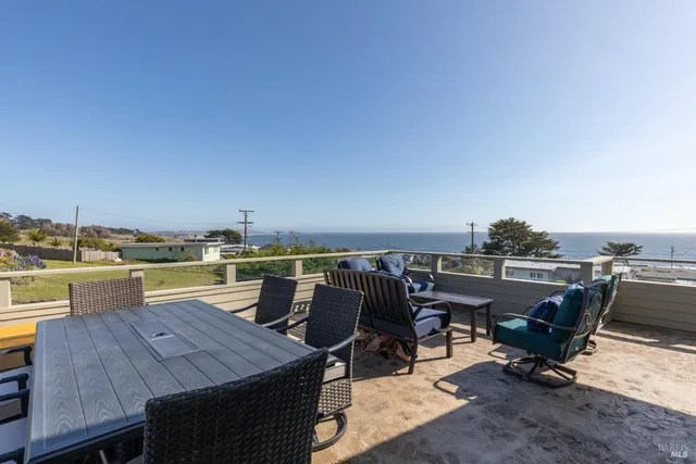 a view of a terrace with seating area