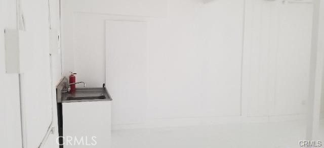 a view of roof deck with a barbeque and wooden stairs