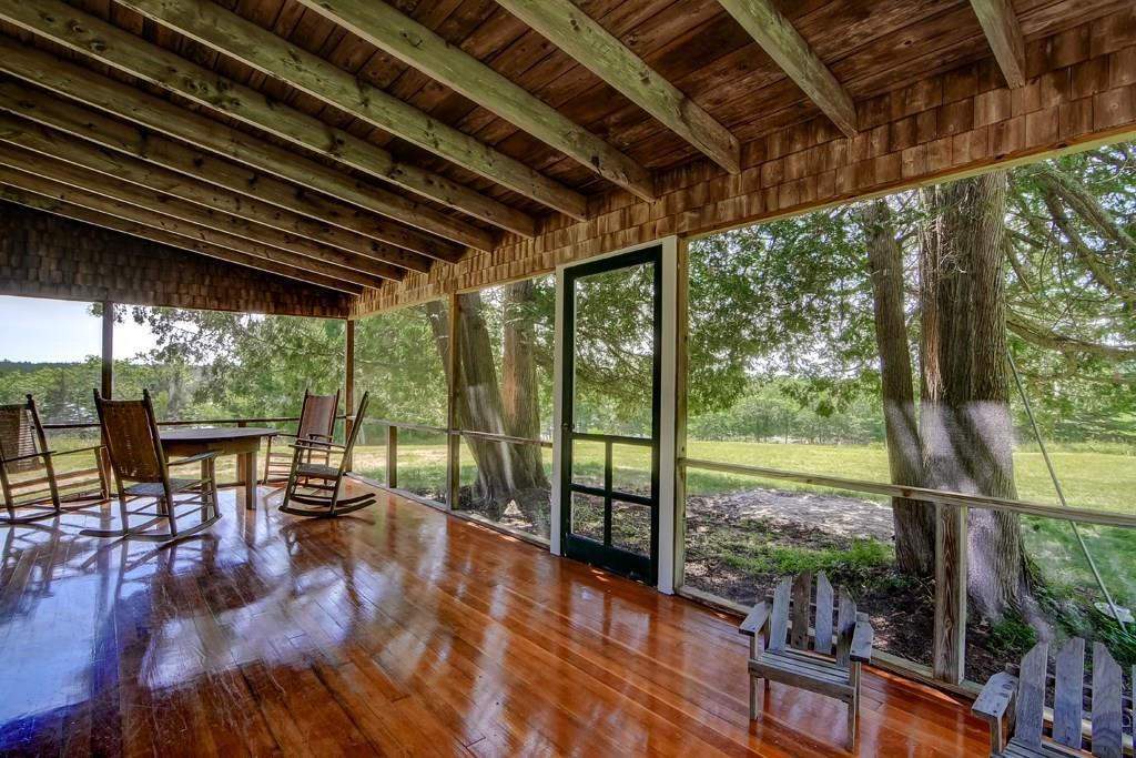 318 Salt Pond Road Blue Hill, ME 04614 - Photo 5 of 35 Large screened porch invites outdoor...
