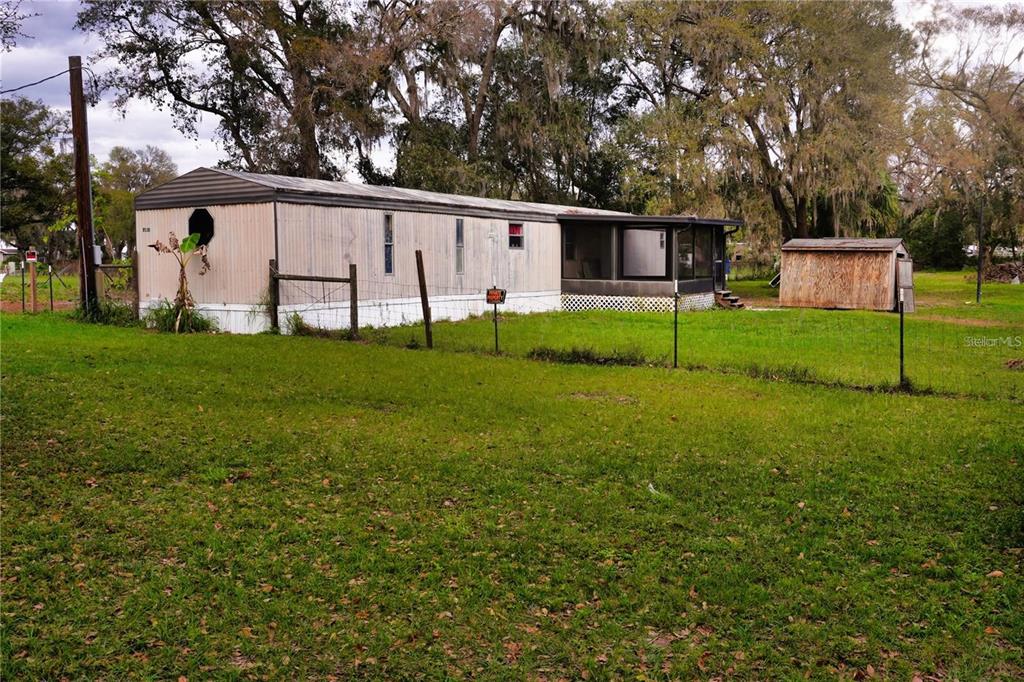 7230 James Stanaland Road Plant City, FL 33567 - Photo 4 of 26 a view of a house with backyard