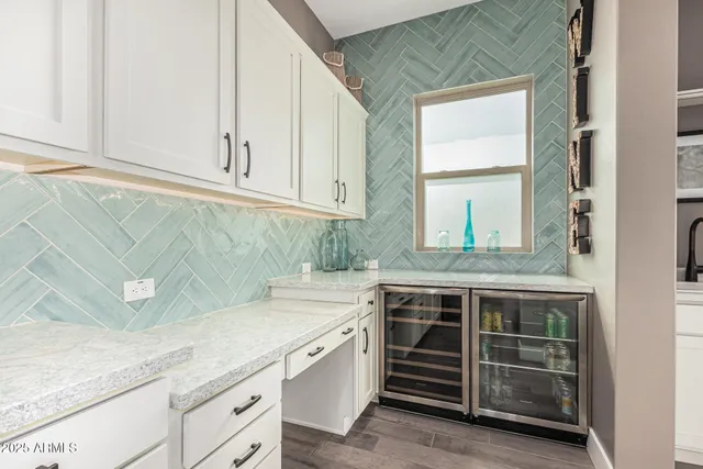 a living room with large windows