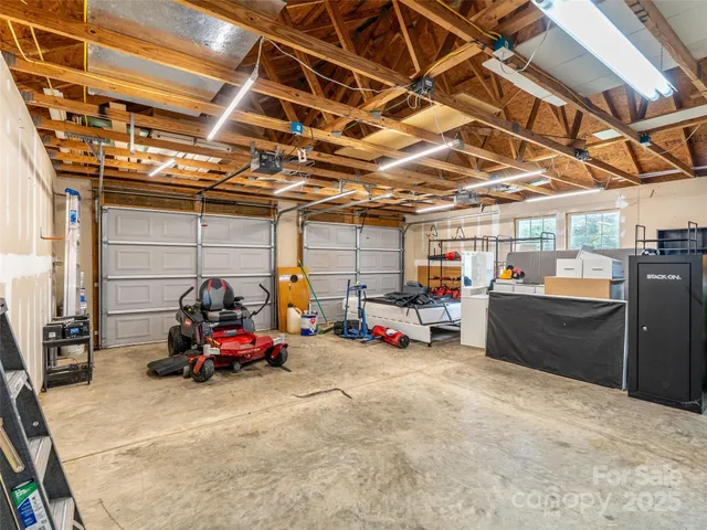 a view of parking garage with cars