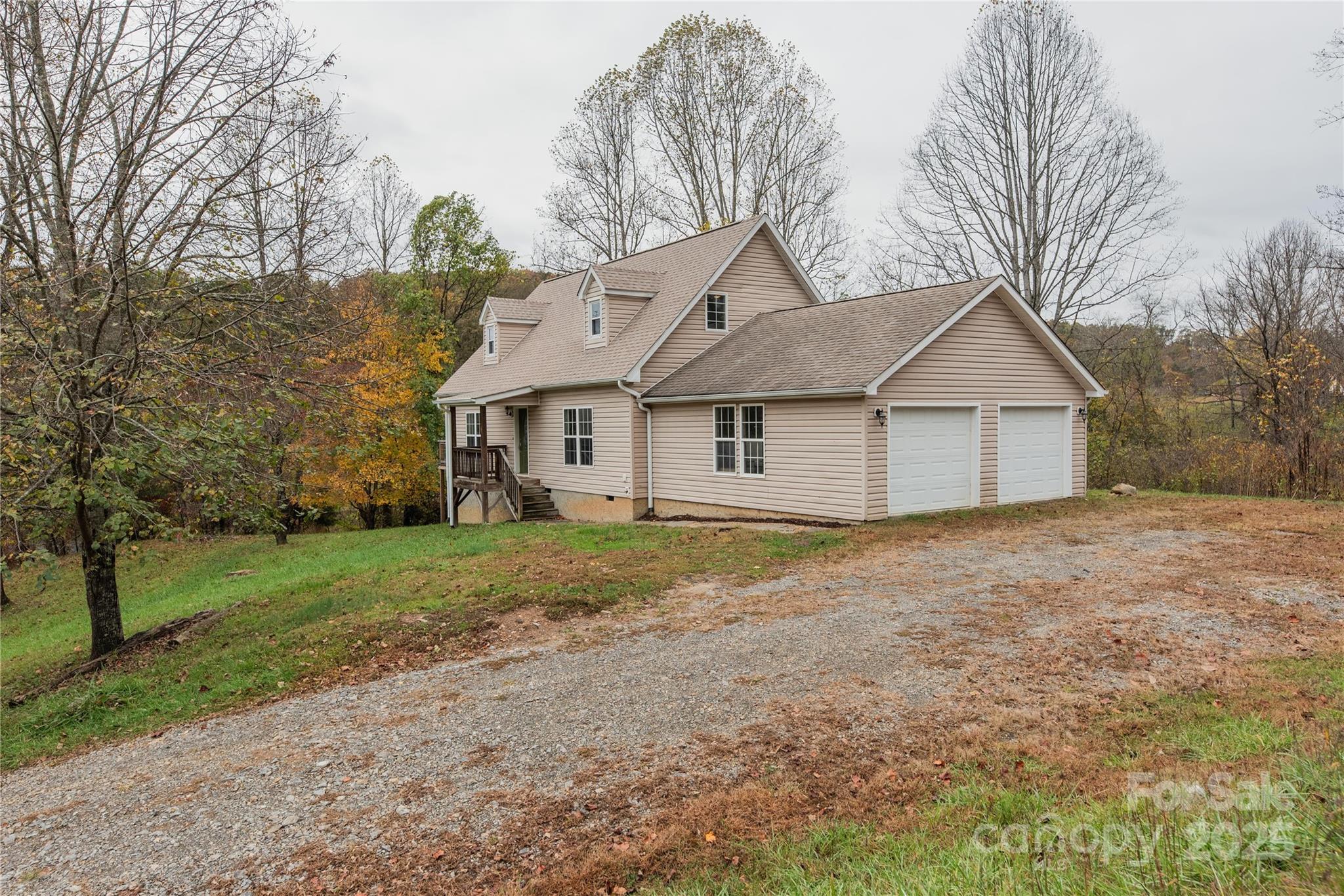 99 Curtis Parker Road Alexander, NC 28701 - Photo 3 of 24 a house with trees in the background