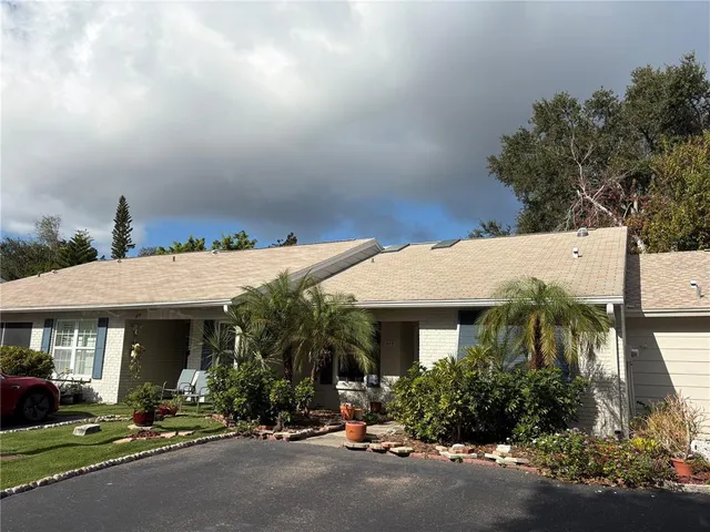a view of a building with sitting area