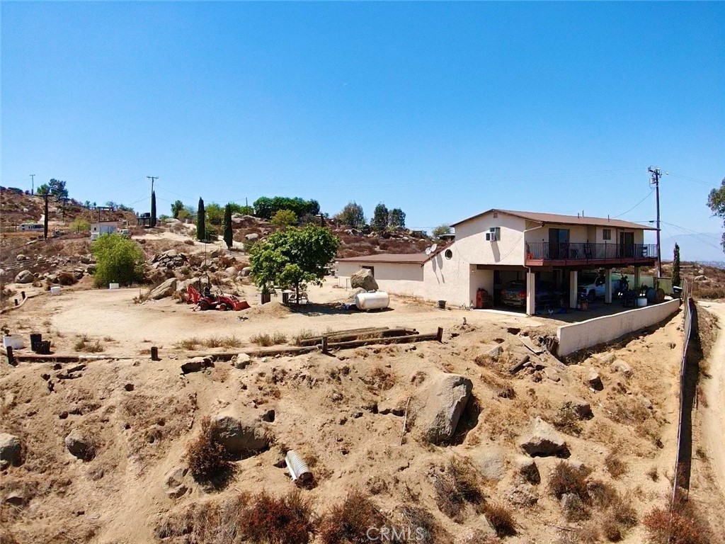 20320 Roads End Drive Perris, CA 92570 - Photo 1 of 21 a view of a terrace with snow