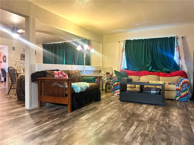 a bedroom with furniture and a bed