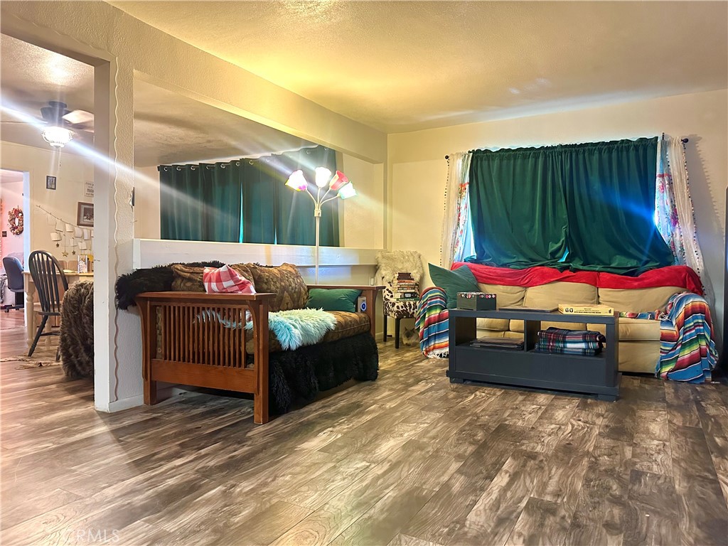 20320 Roads End Drive Perris, CA 92570 - Photo 8 of 21 a bedroom with furniture and a bed