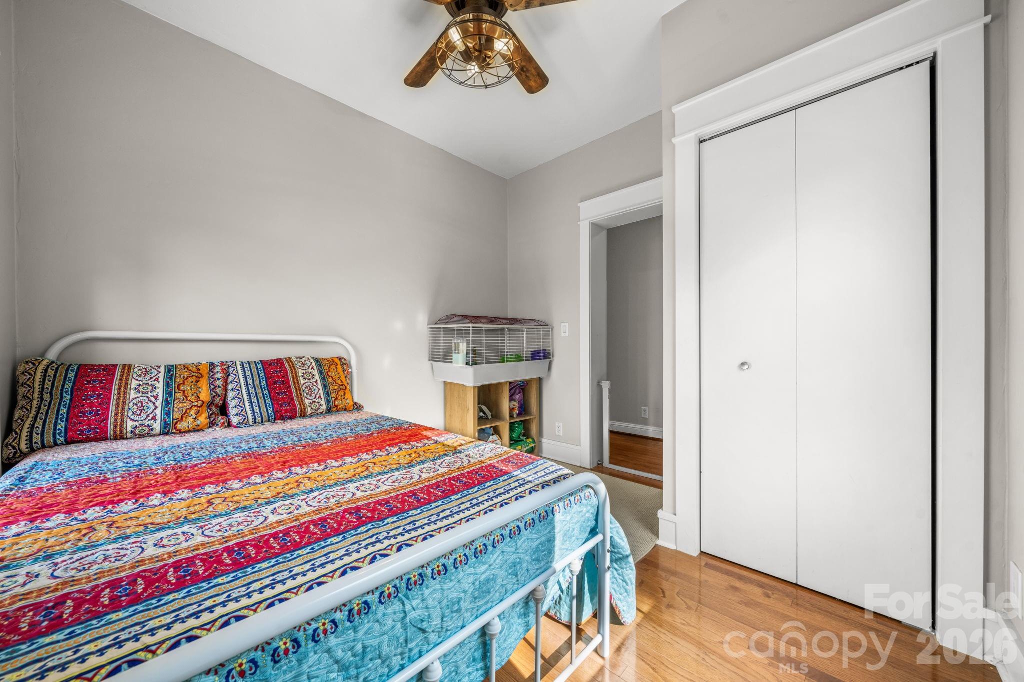 2533 Lail Road Morganton, NC 28655 - Photo 19 of 38 a room with a bed and a book shelf