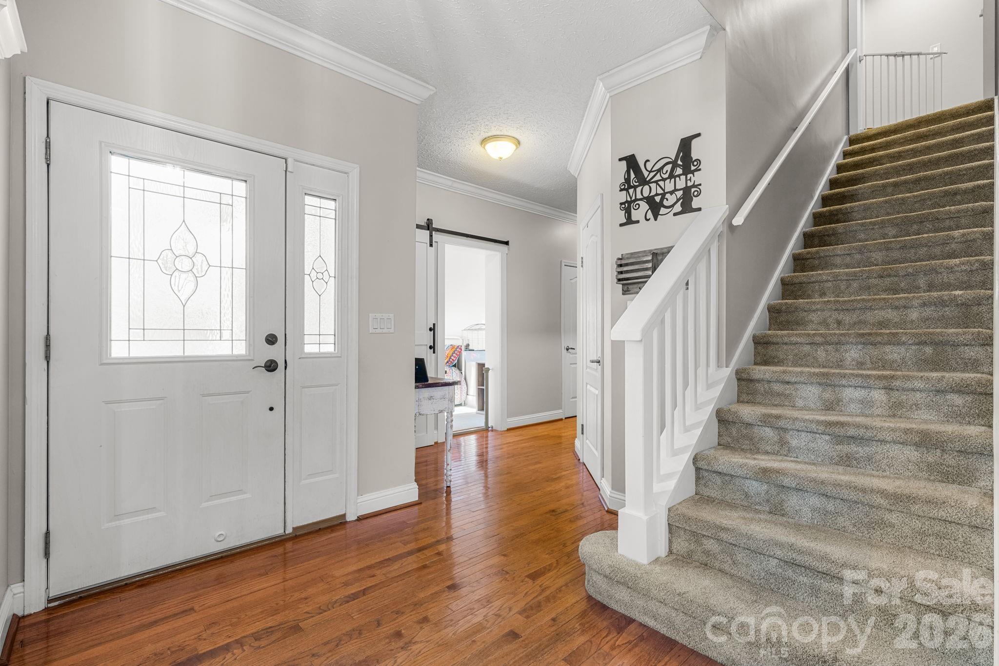 2533 Lail Road Morganton, NC 28655 - Photo 2 of 38 a view of entryway and hall with wooden floor