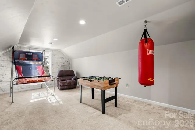 a view of balcony with wooden floor