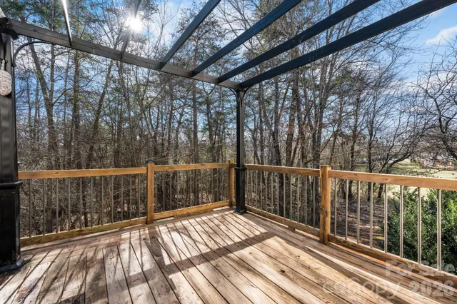 a view of a roof with sitting area