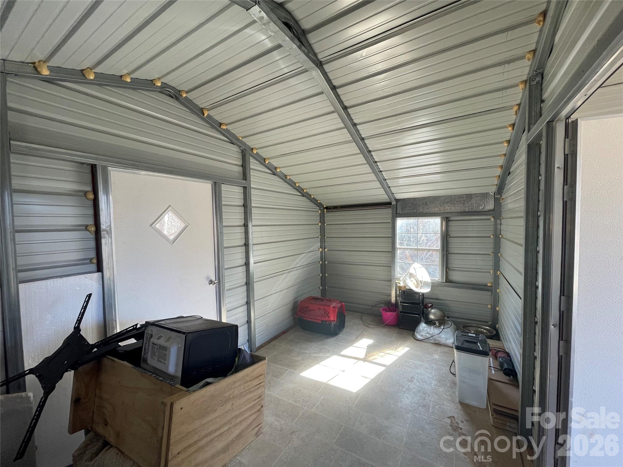 2533 Lail Road Morganton, NC 28655 - Photo 31 of 38 a bedroom with furniture and a window