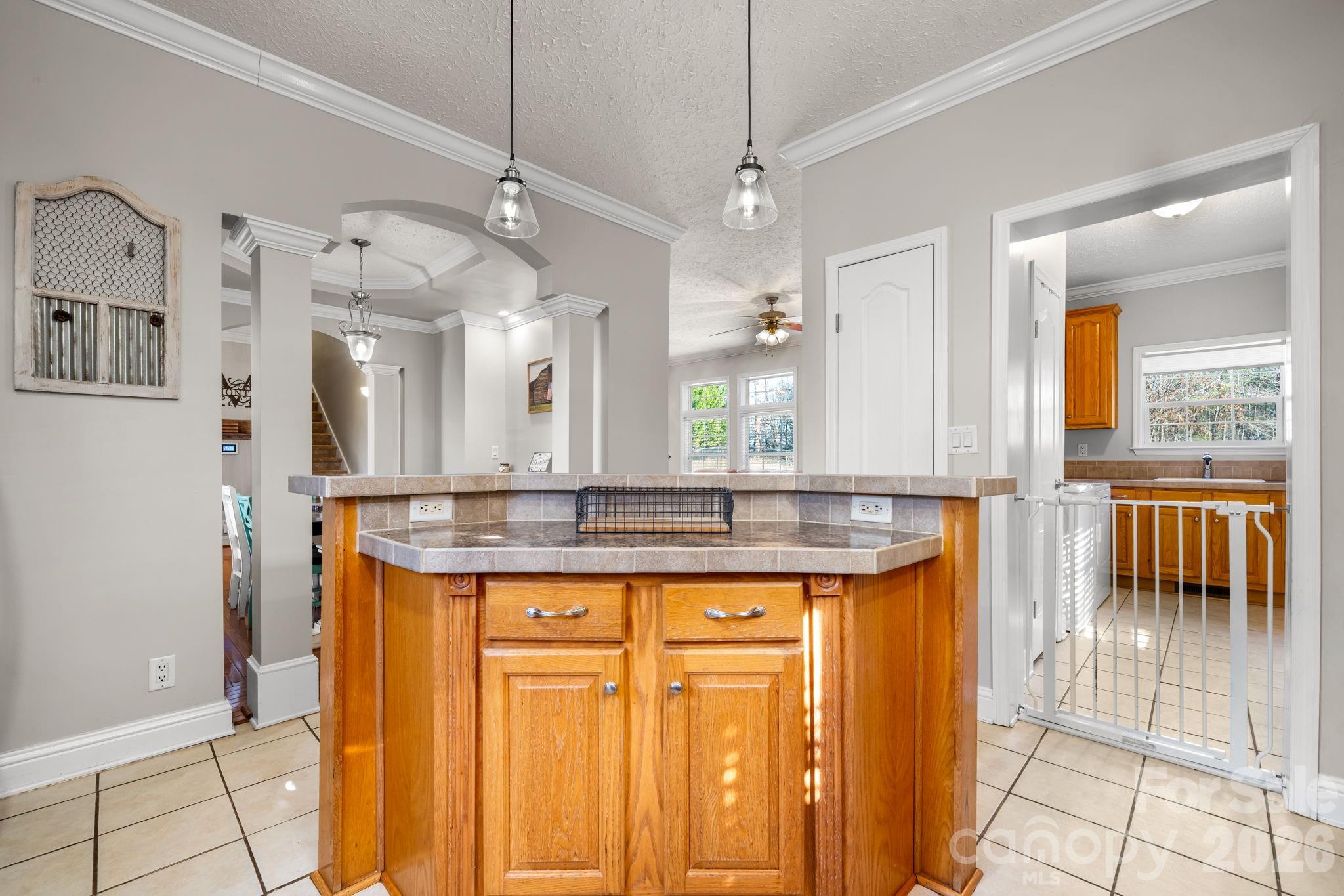 2533 Lail Road Morganton, NC 28655 - Photo 8 of 38 a bathroom with a granite countertop sink a mirror and a shower
