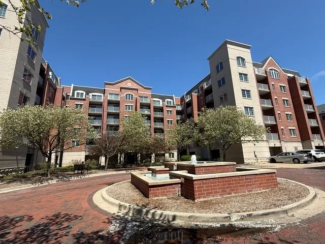 a view of a building with swimming pool