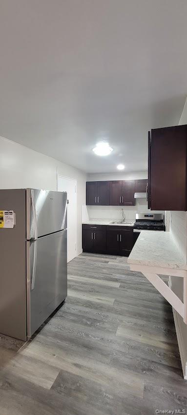 141-60 84th Road, Unit 2G Queens, NY 11435 - Photo 4 of 11 a large white bed in a white room