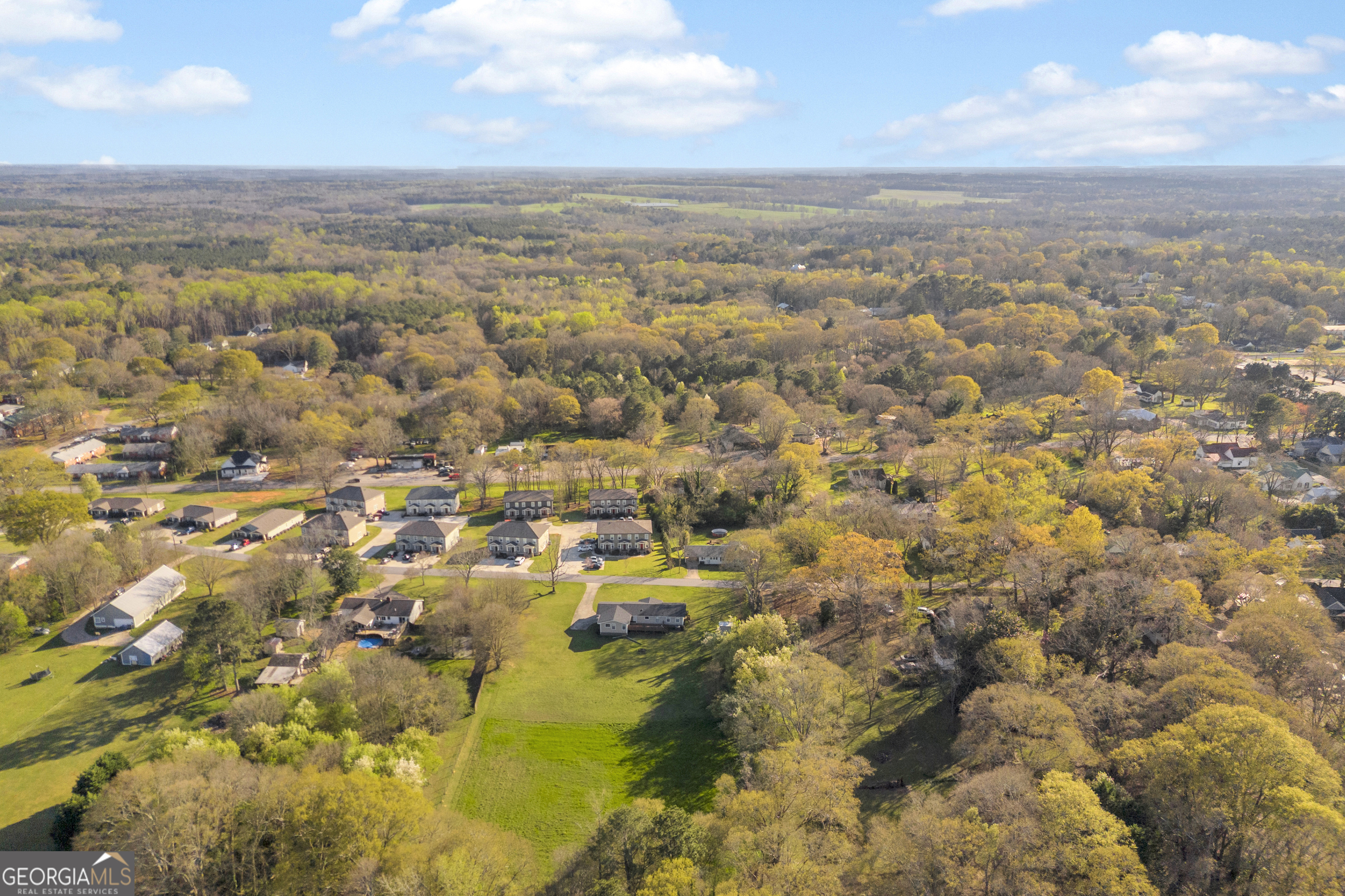 0 Oak Street Comer, GA 30629 - Photo 7 of 20 an aerial view of residential houses with outdoor space