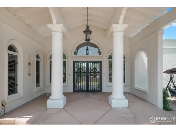 a front view of a house with a porch