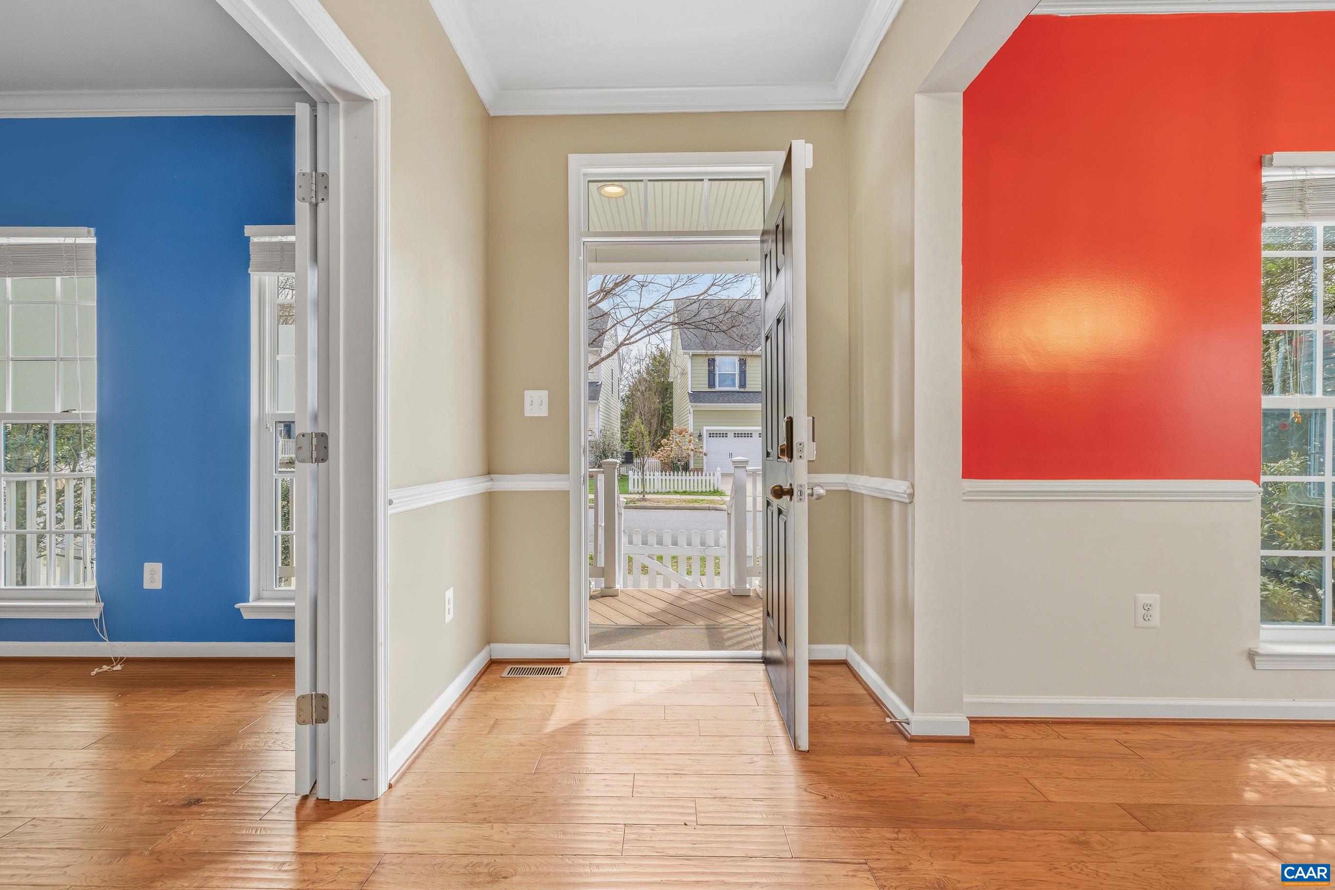1838 Wickham Place Charlottesville, VA 22901 - Photo 11 of 53 a view of a hallway with wooden floor and a living room