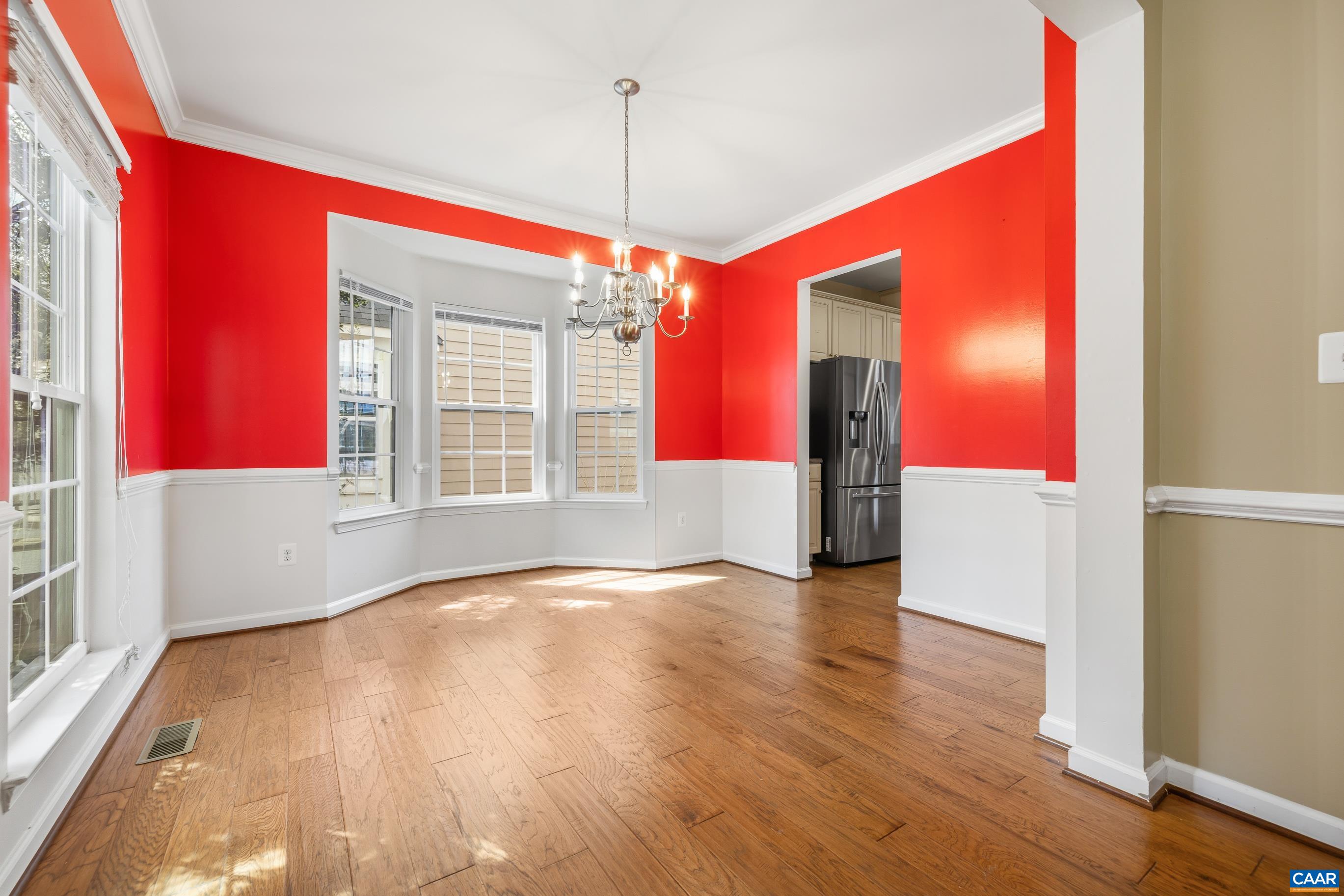 1838 Wickham Place Charlottesville, VA 22901 - Photo 15 of 53 a view of an empty room with window and wooden floor