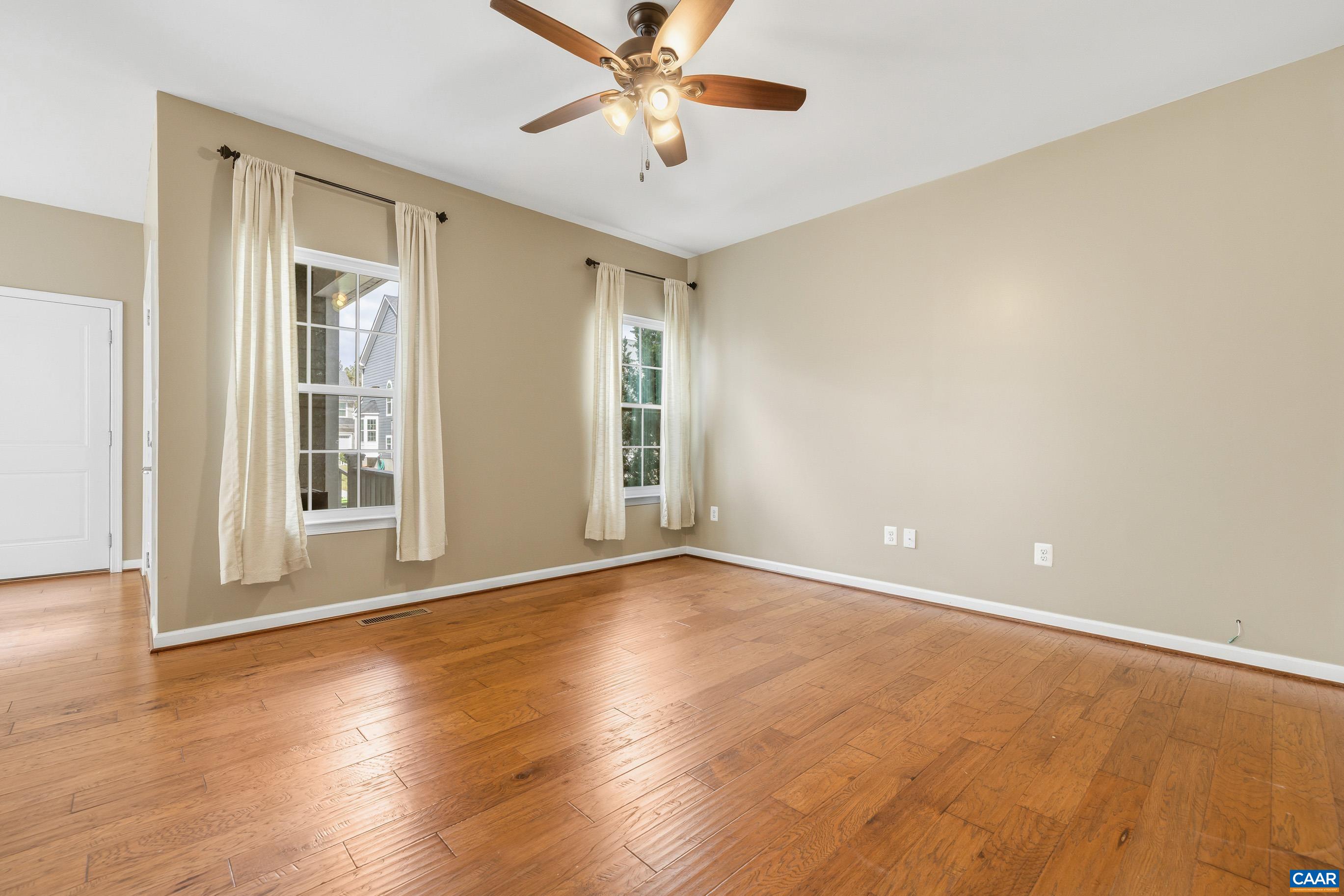 1838 Wickham Place Charlottesville, VA 22901 - Photo 18 of 53 a view of an empty room with window and wooden floor