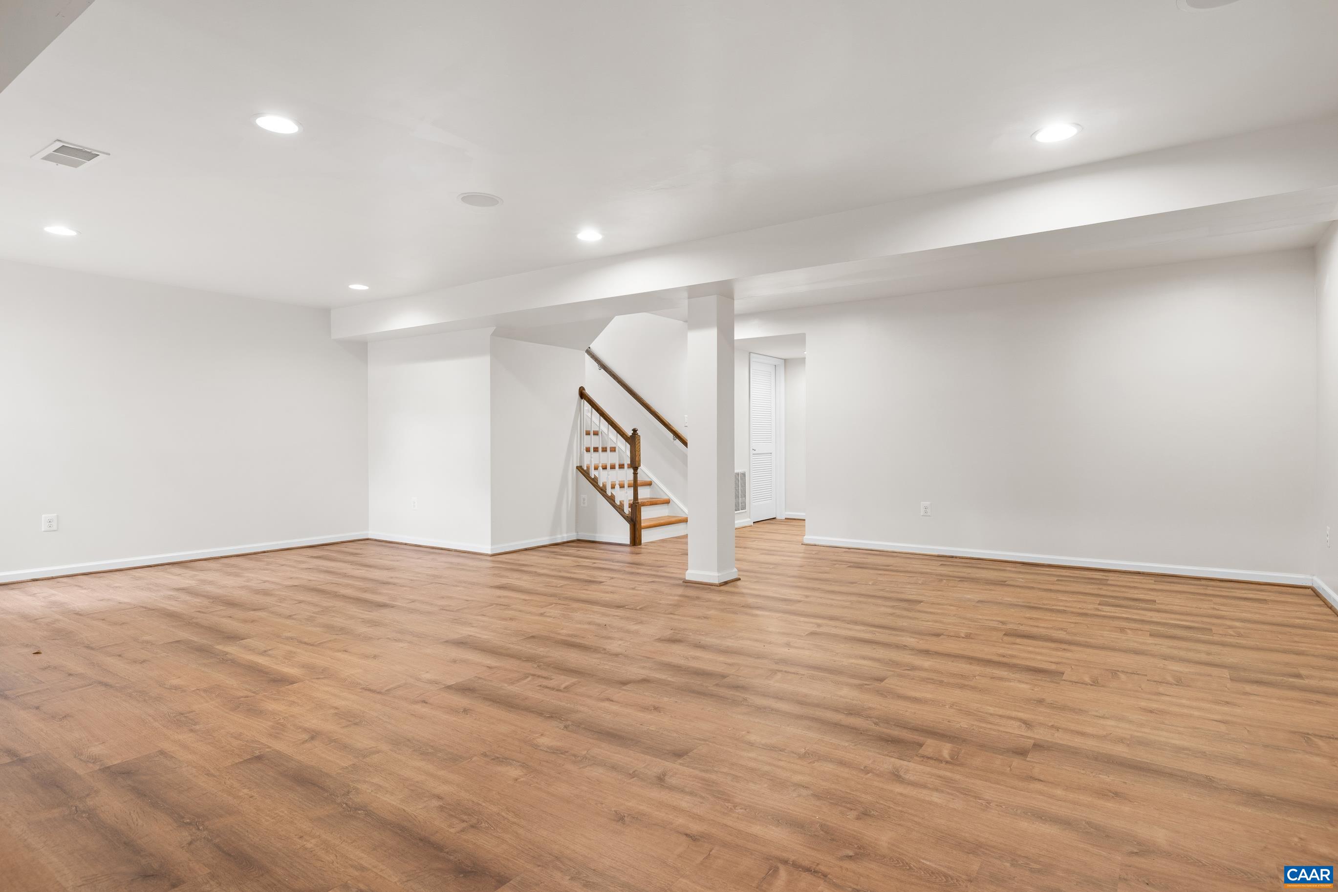 1838 Wickham Place Charlottesville, VA 22901 - Photo 34 of 53 a view of an empty room with wooden floor