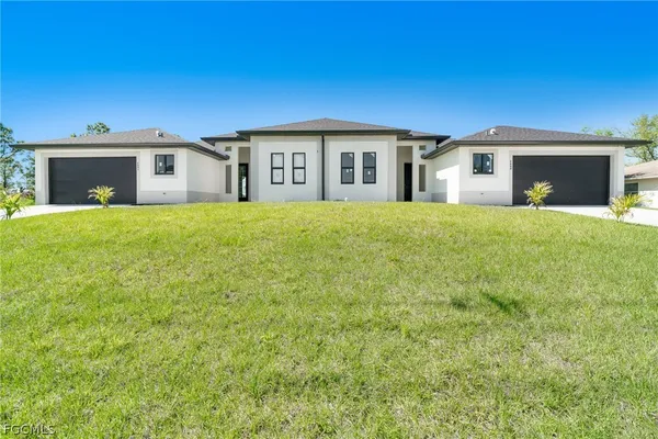 a house view with a garden space