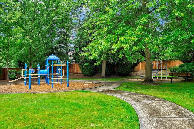 a view of a park with slide