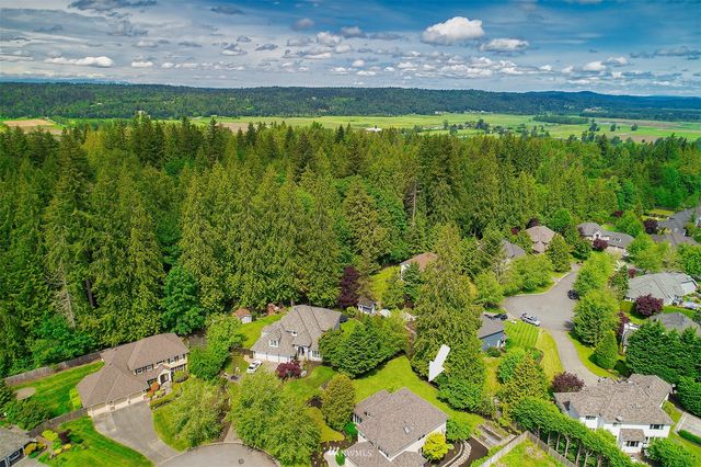 a view of a lake with a yard