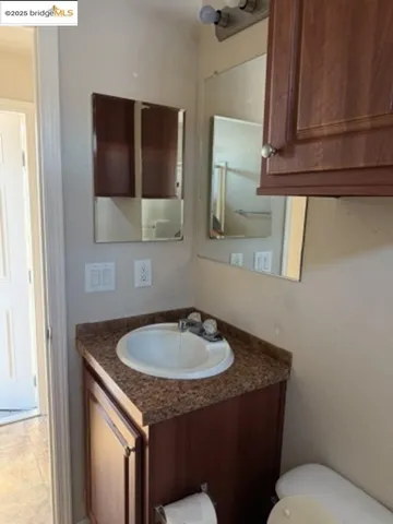 a bathroom with a sink and a toilet