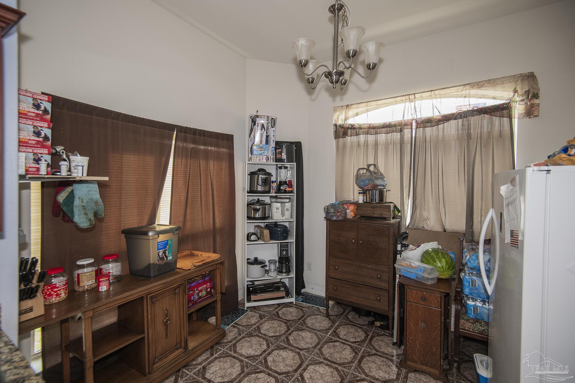 5800 Providence Loop Pensacola, FL 32526 - Photo 5 of 29 a room with storage and utility