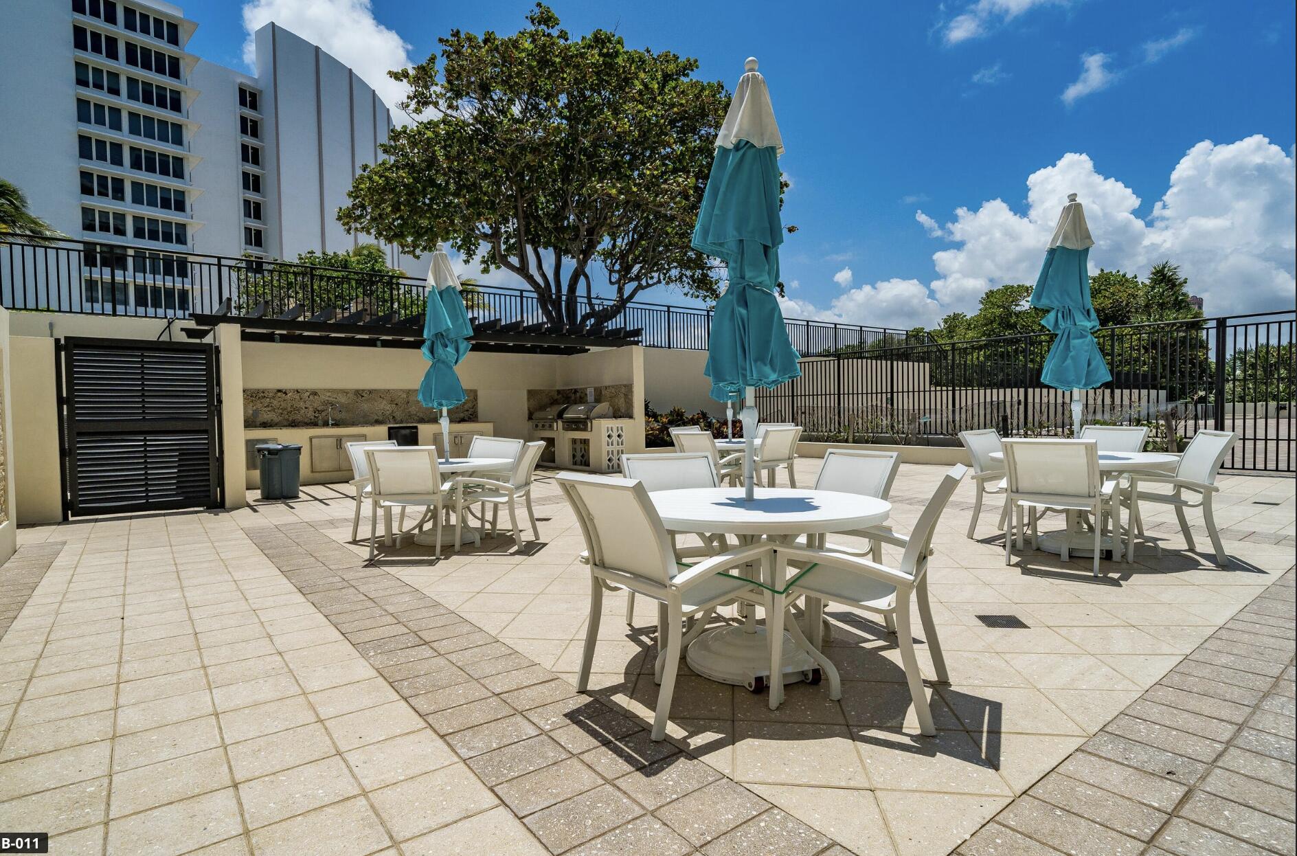 600 South Ocean Boulevard, Unit 1402 Boca Raton, FL 33432 - Photo 27 of 35 Sabal Shoes outside pool dining area