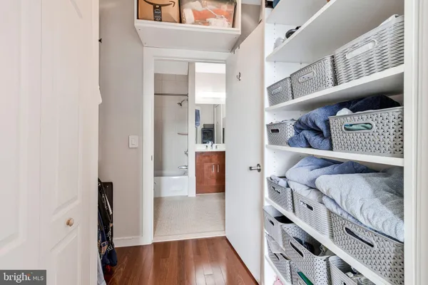 a view of an entryway with wooden floor