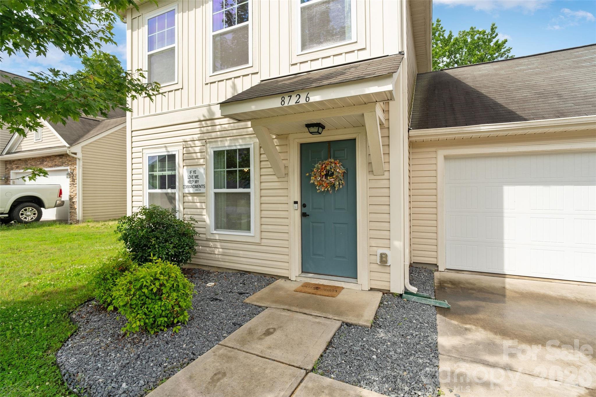 8726 Conrad Street Locust, NC 28097 - Photo 28 of 36 a view of a house with a yard