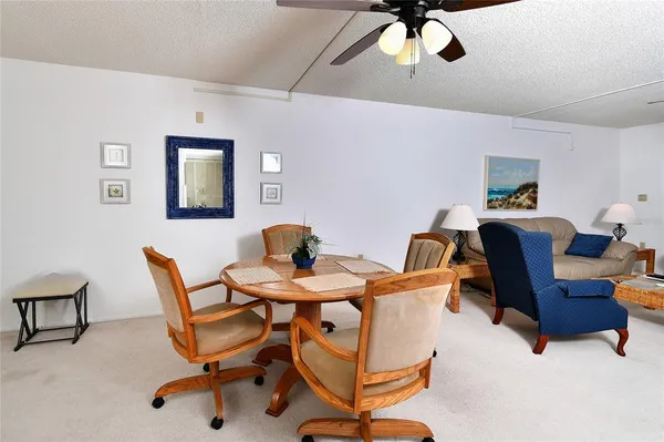 a view of a dining room with furniture