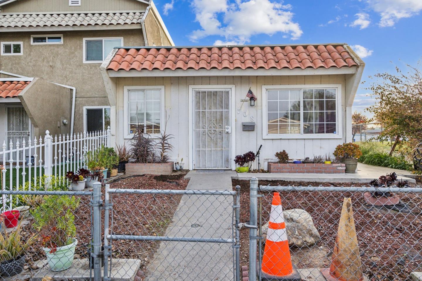 708 Sequoia Boulevard Tracy, CA 95376 - Photo 1 of 14 a front view of a house with outdoor seating