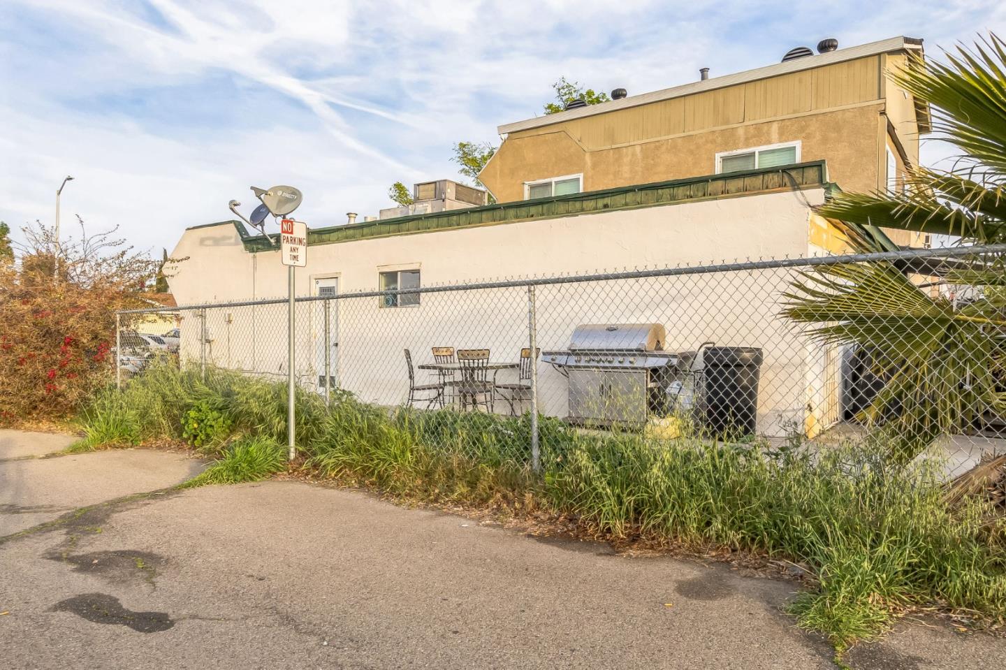 708 Sequoia Boulevard Tracy, CA 95376 - Photo 14 of 14 a view of a street with a building in the background