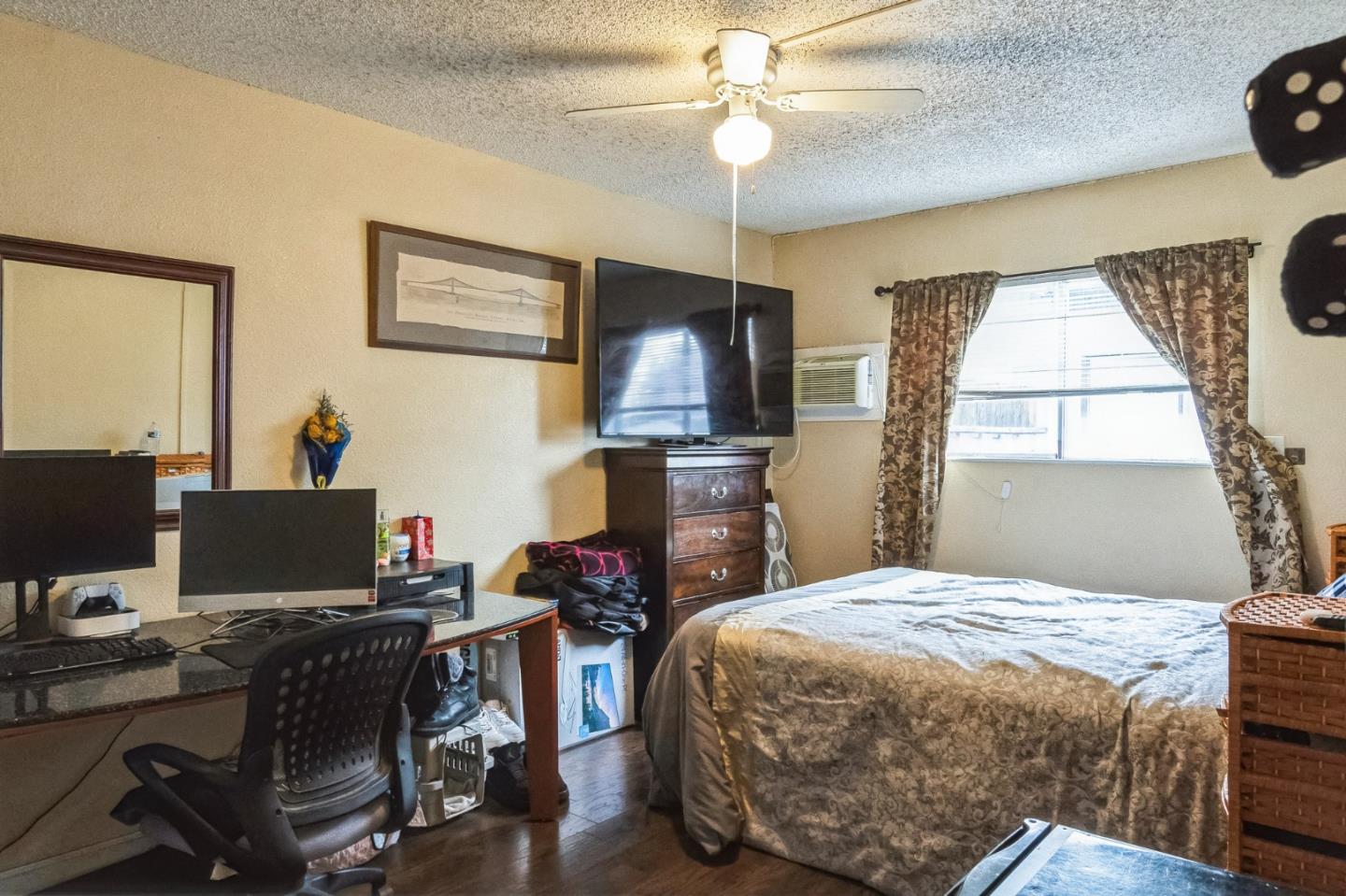 708 Sequoia Boulevard Tracy, CA 95376 - Photo 9 of 14 a bedroom with a bed and a desk