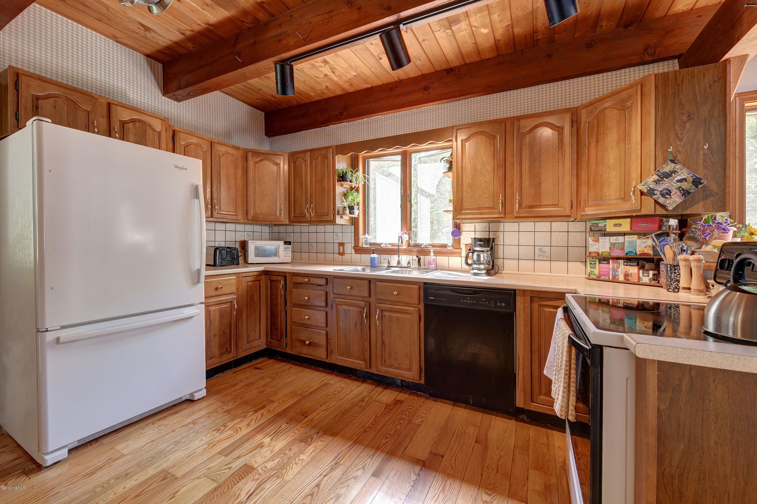 26 Andes Road Peru, MA 01235 - Photo 13 of 52 a kitchen with granite countertop wooden floors and stainless steel appliances