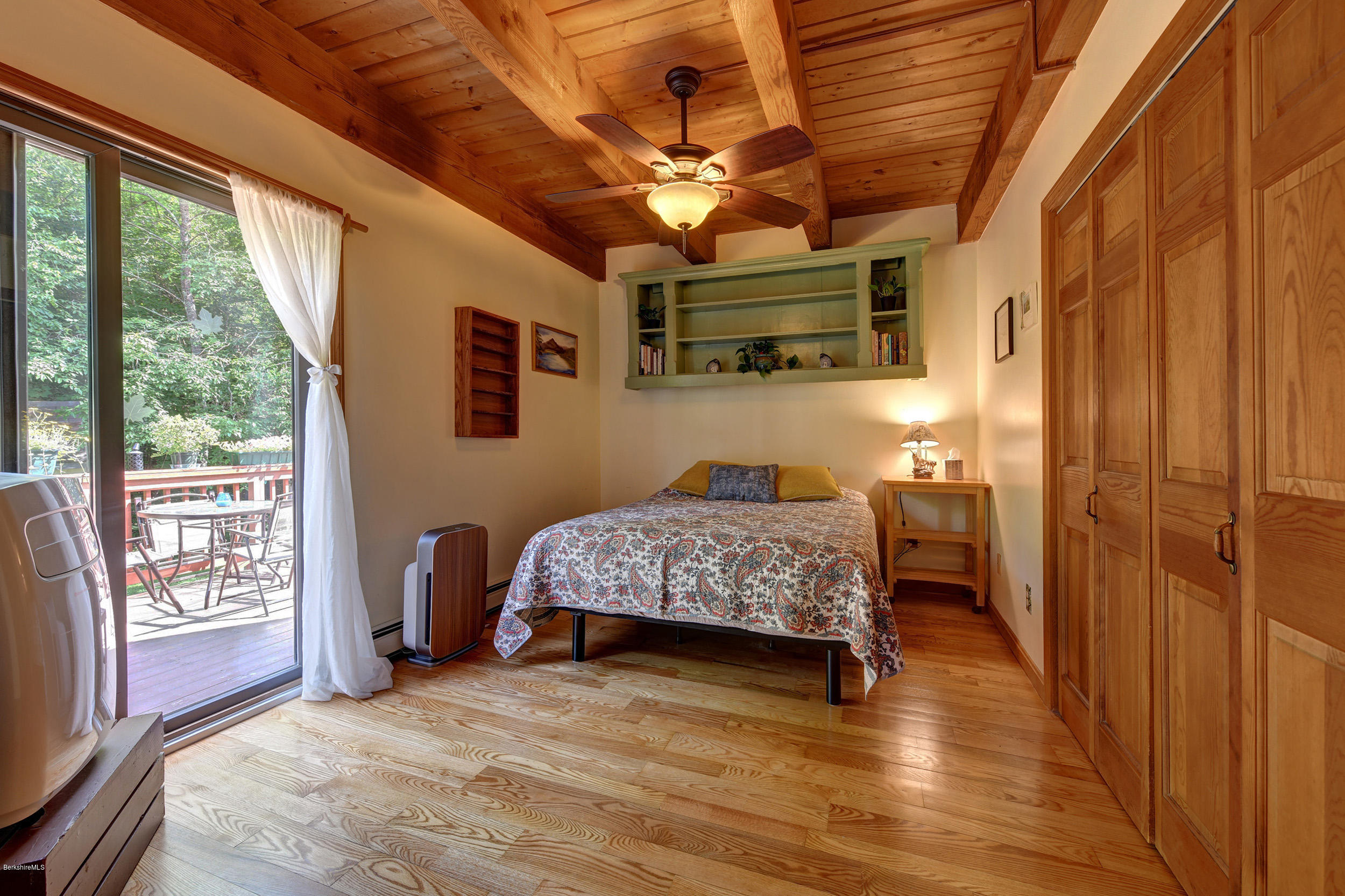 26 Andes Road Peru, MA 01235 - Photo 16 of 52 a bedroom with a bed and wooden floor