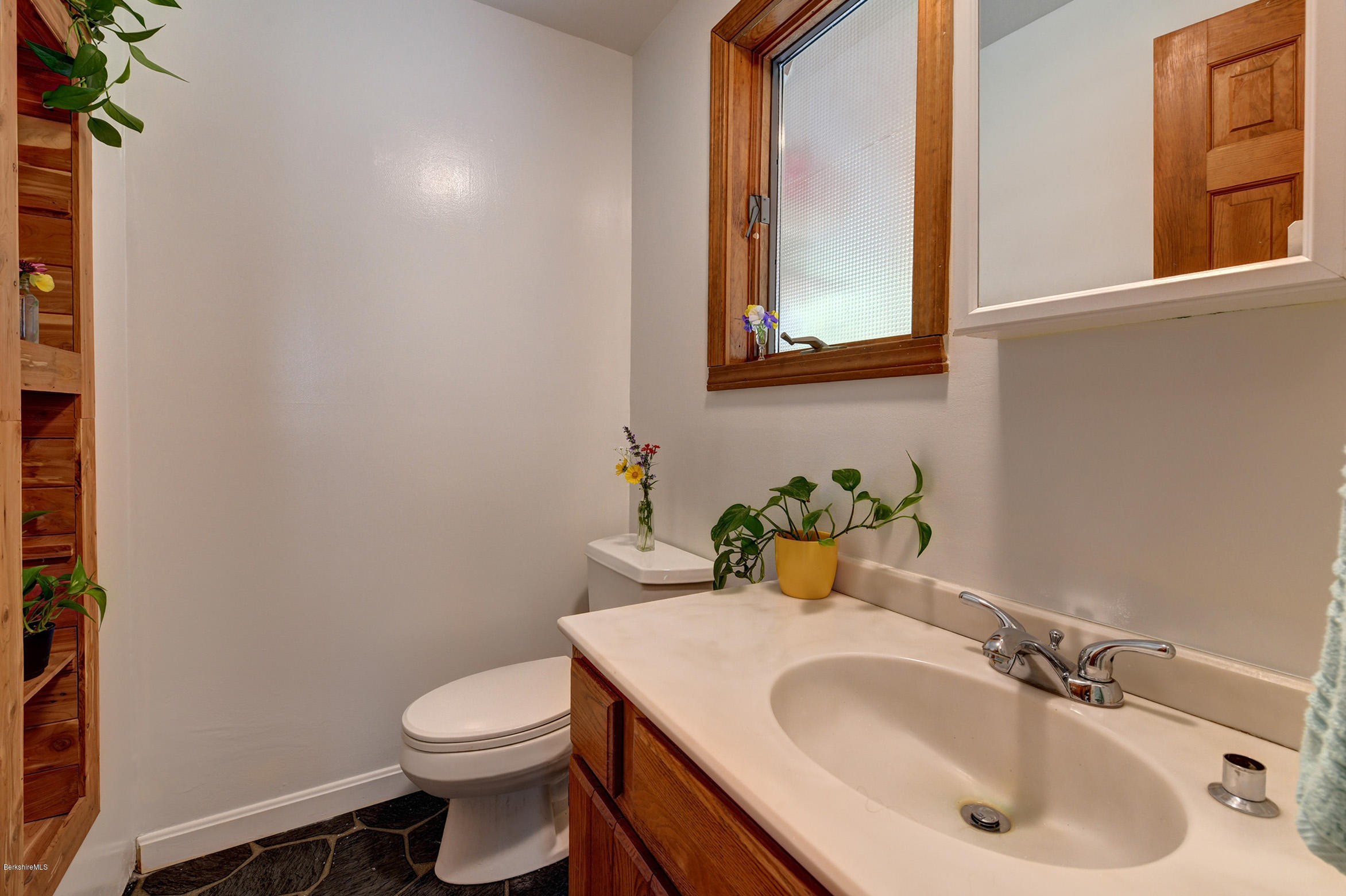26 Andes Road Peru, MA 01235 - Photo 18 of 52 a bathroom with a sink a toilet and mirror
