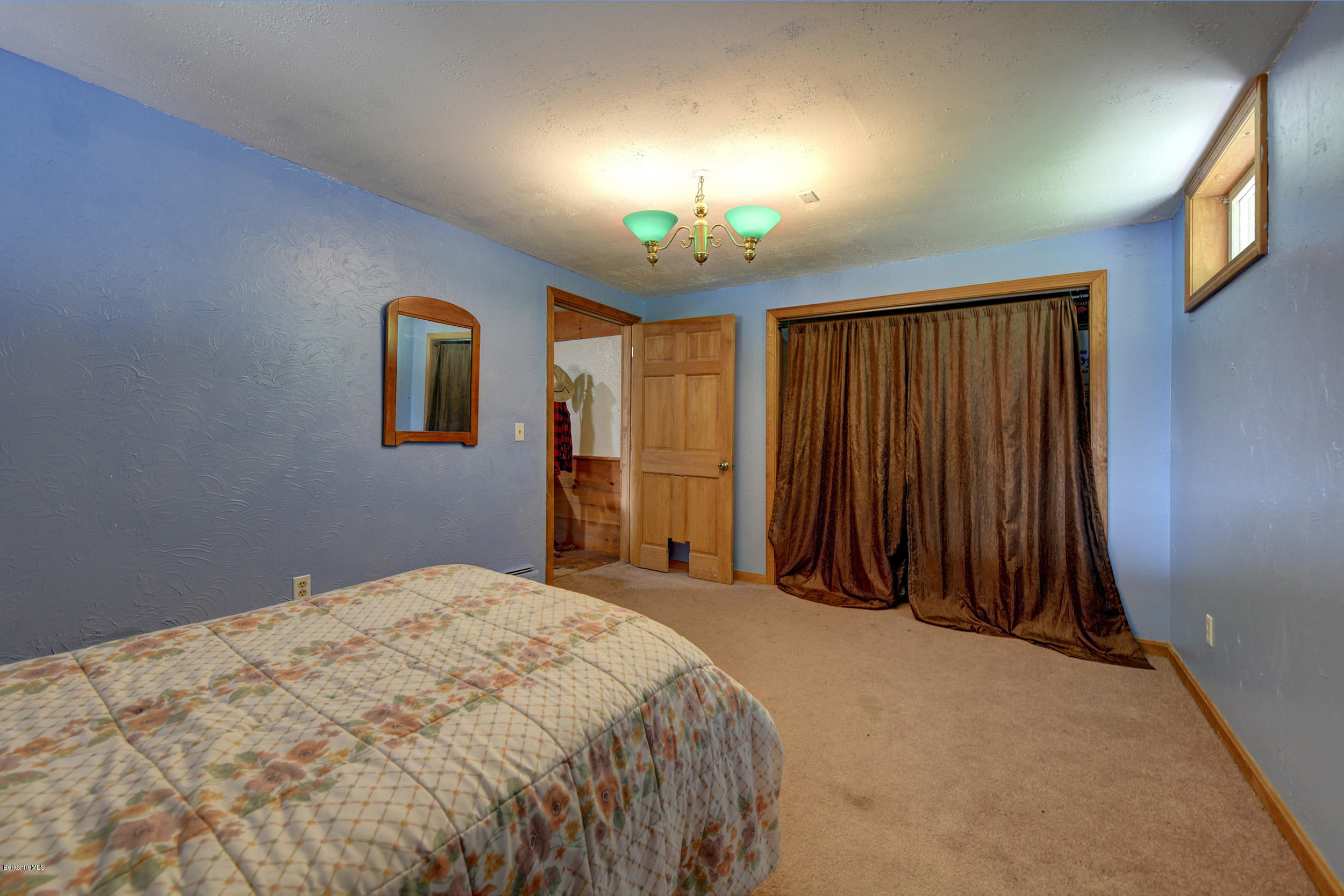26 Andes Road Peru, MA 01235 - Photo 27 of 52 a bed sitting in a spacious bedroom next to a window
