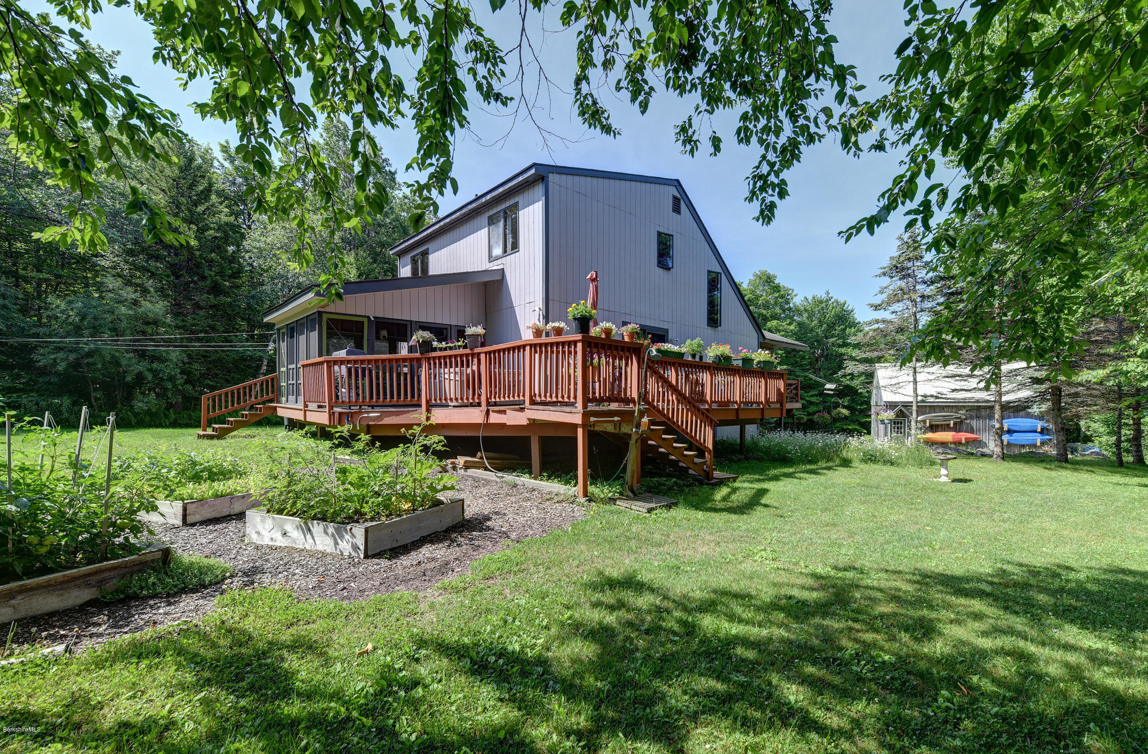 26 Andes Road Peru, MA 01235 - Photo 34 of 52 a view of a house with a yard and sitting area