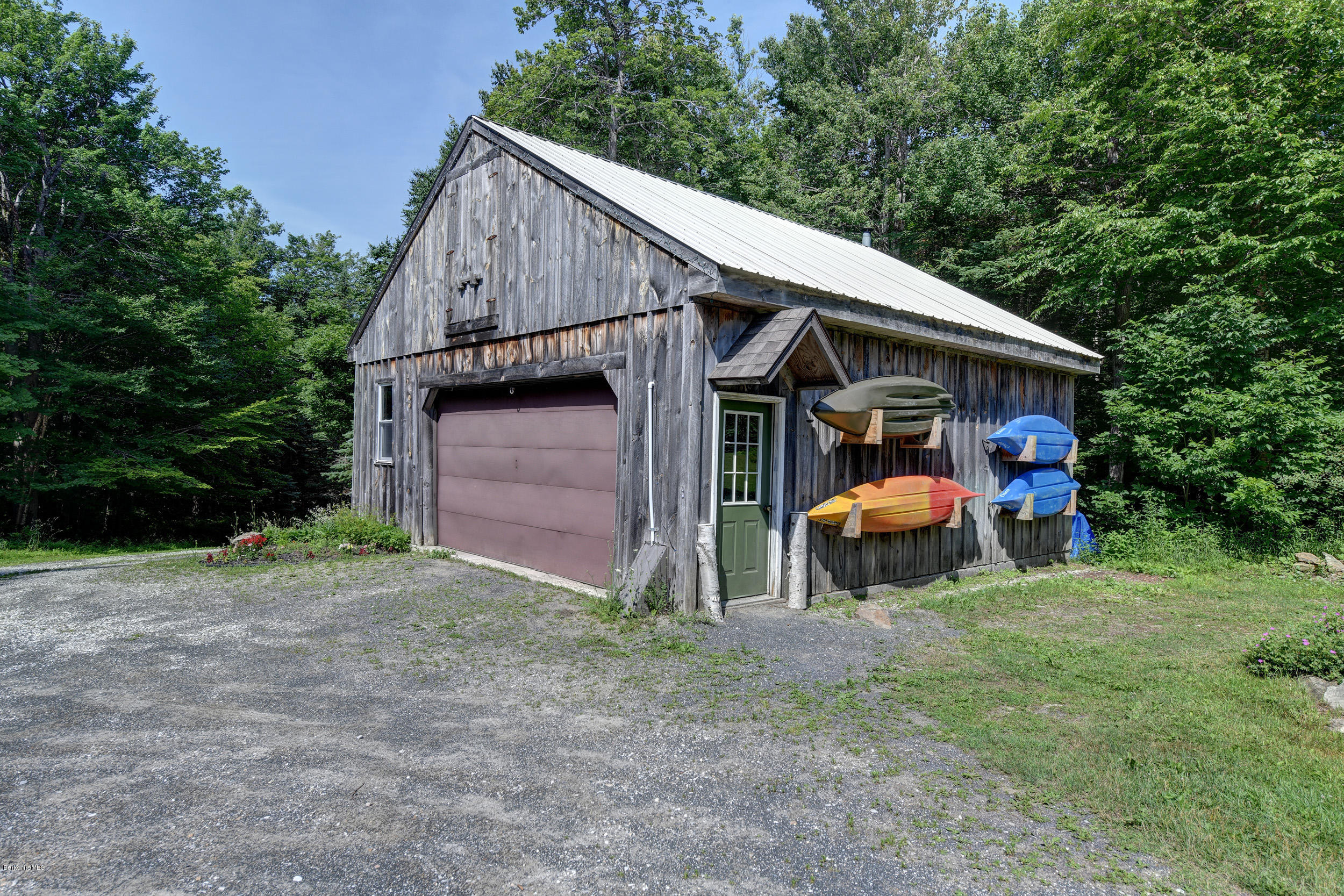 26 Andes Road Peru, MA 01235 - Photo 41 of 52 a view of a house with a yard and roof