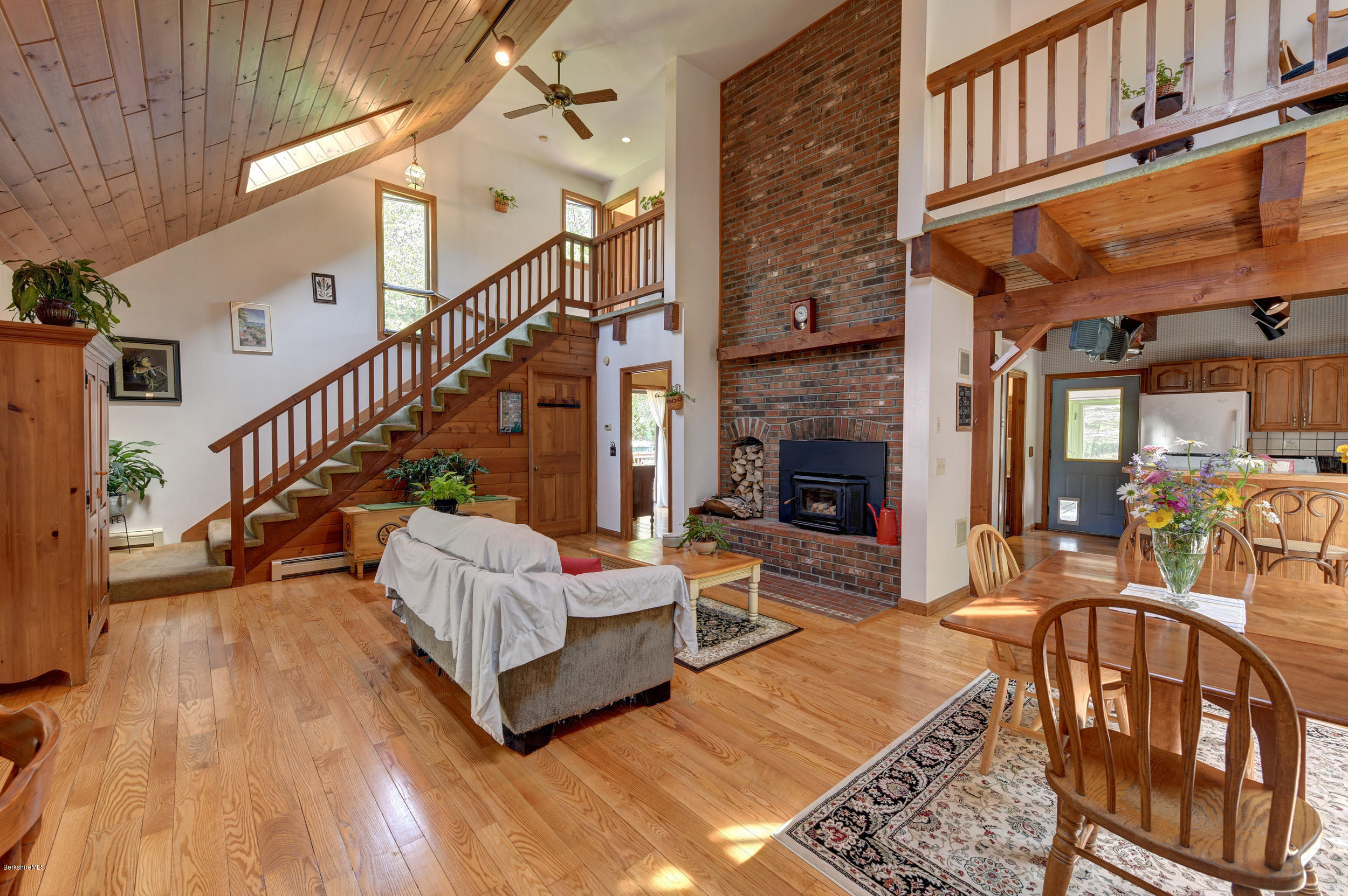 26 Andes Road Peru, MA 01235 - Photo 8 of 52 a living room with furniture fireplace and a rug