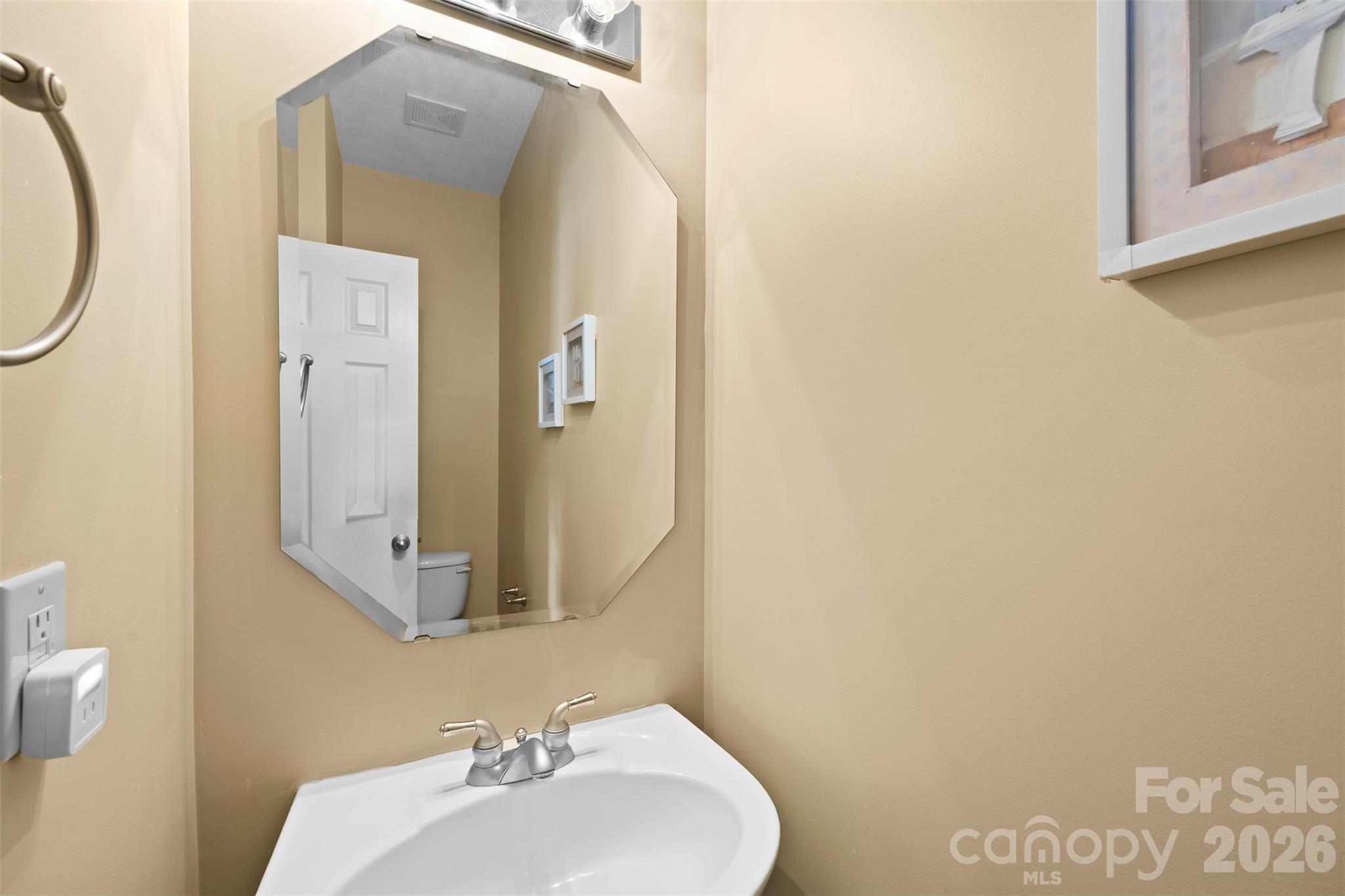 1720 Grove Tree Lane Clover, SC 29710 - Photo 16 of 43 a bathroom with a sink and a mirror